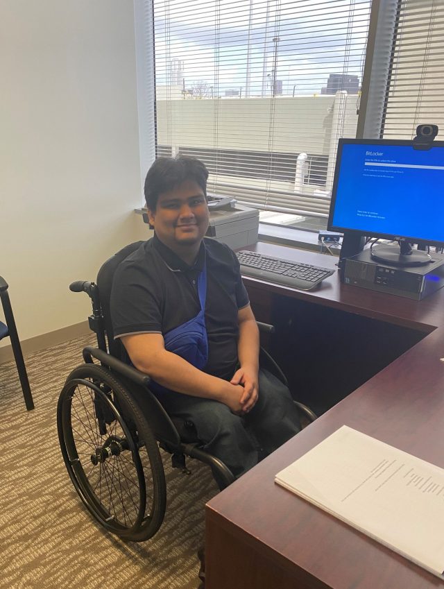 Allan working summer internship in Easter Seals Greater Houston's Human Resources department
