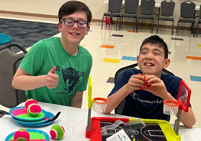 Children playing with toys at PNO Katy.