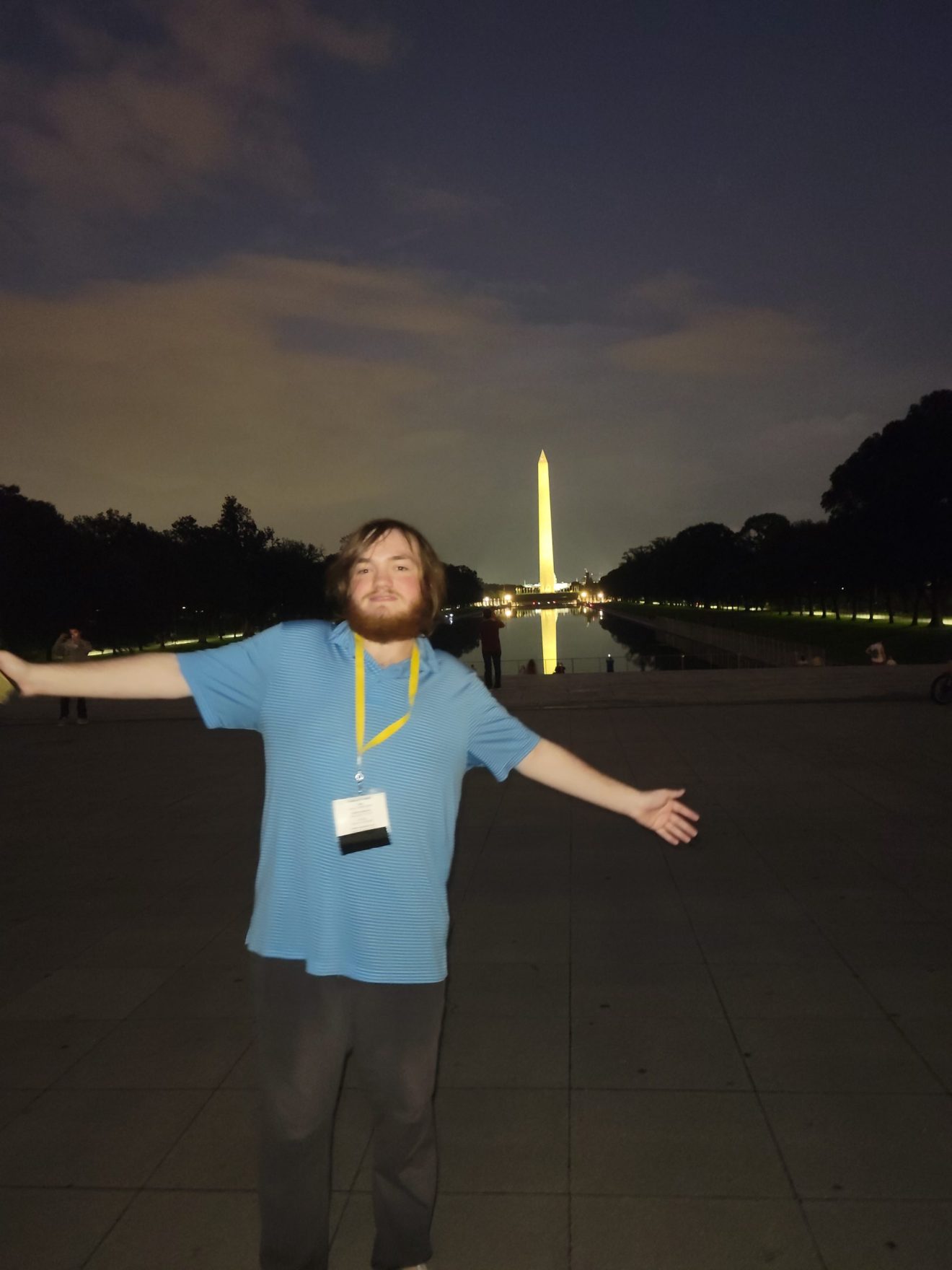 Kaden posing in front of the Washington monument in DC.