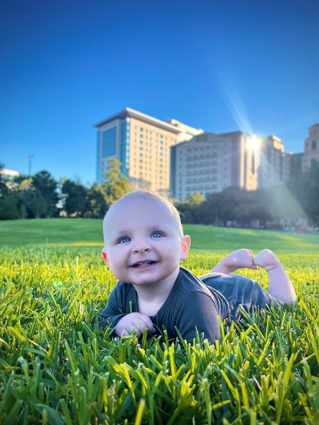 Dax Baker laying in grass Baby Dax laying in the grass.