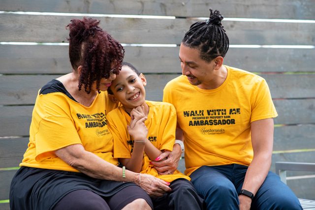 Ryan, 10, with his grandmother, Jackie and uncle, Jared on the playground at Easterseals of Greater Houston, in Houston, TX on May 2, 2023. (Easterseals photo-Rohanna Mertens)
