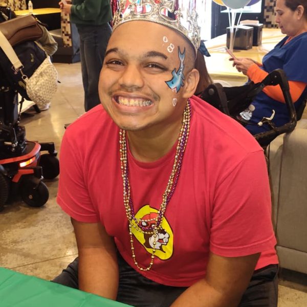 Easter Seals Houston Adult Program participant with a huge smile